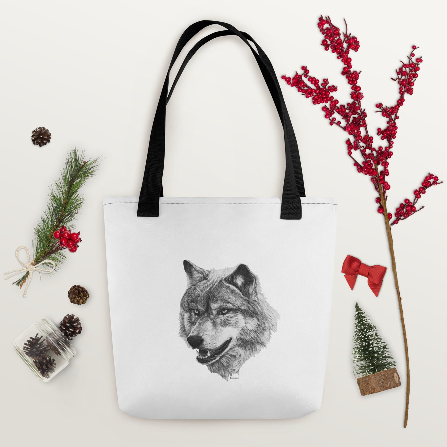 This "Wolf Tote Bag" is from a drawing of mine created with a graphite pencil. It has been digitally optimized and transferred to a 100% spun polyester fabric.