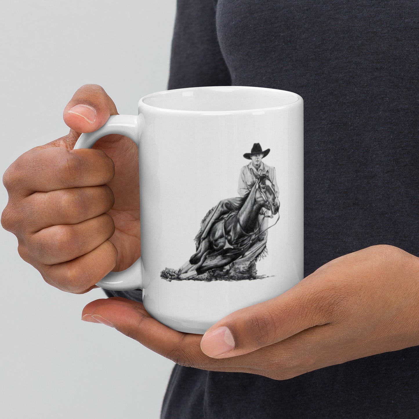 This "Cowboy White Glossy Mug" is from a drawing of mine created with graphite pencil. It is titled "A Cut Above" as it is a cowboy on a cutting horse. It has been digitally optimized and transferred to a 15oz white glossy mug.