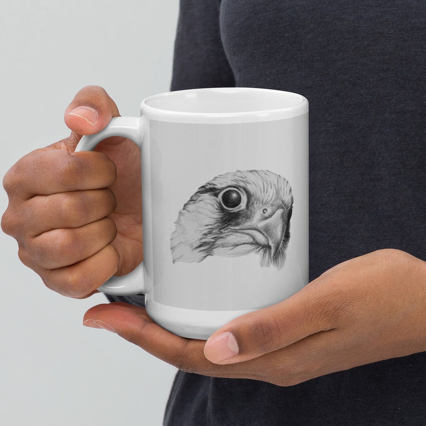 This "Hawk White Glossy Mug" is from a drawing of mine created with a graphite pencil. It has been digitally optimized and transferred to a 15oz white glossy mug.