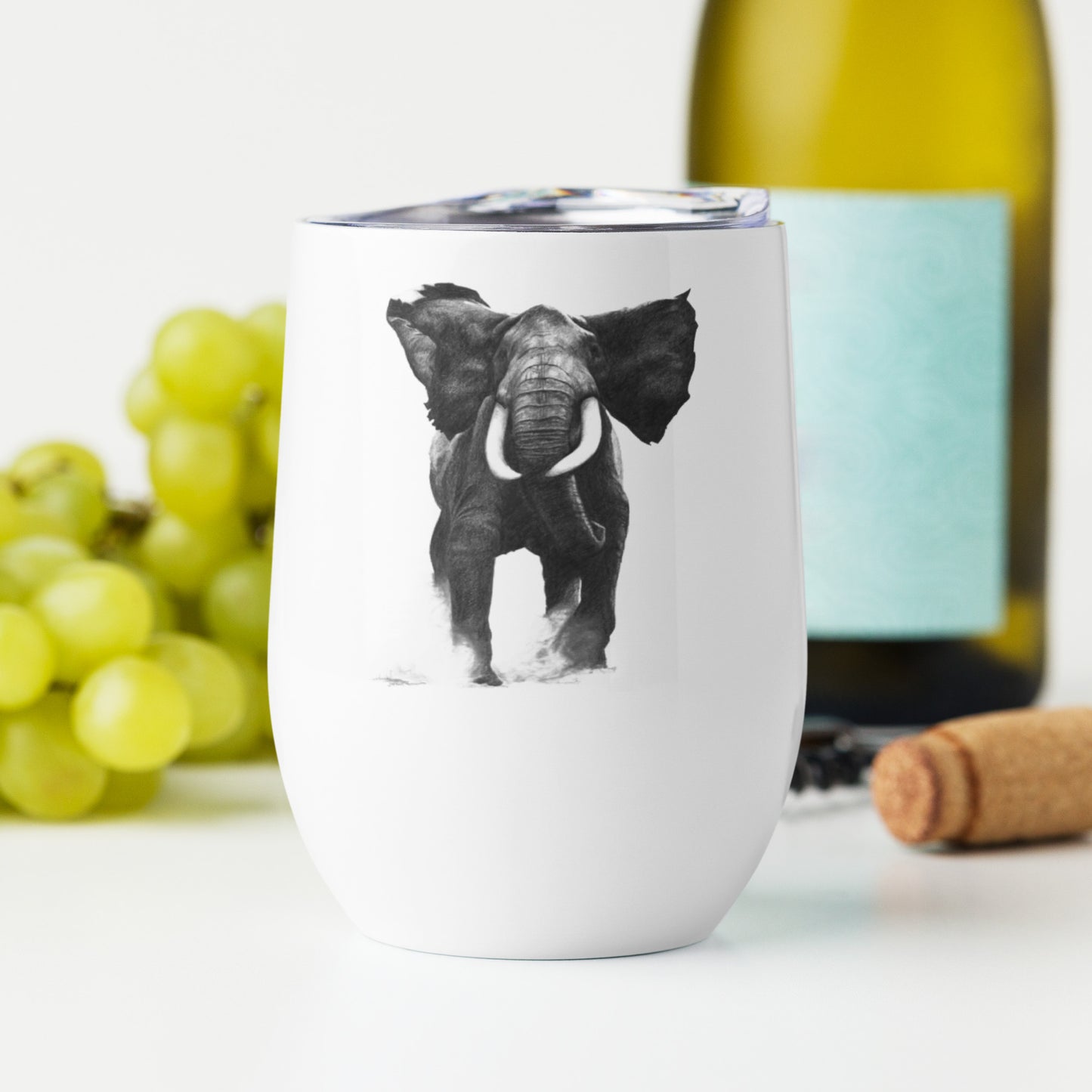 This "Elephant Wine Tumbler" is from a drawing of mine created with a graphite pencil. It has been digitally optimized and transferred to a 12oz White Wine Tumbler.