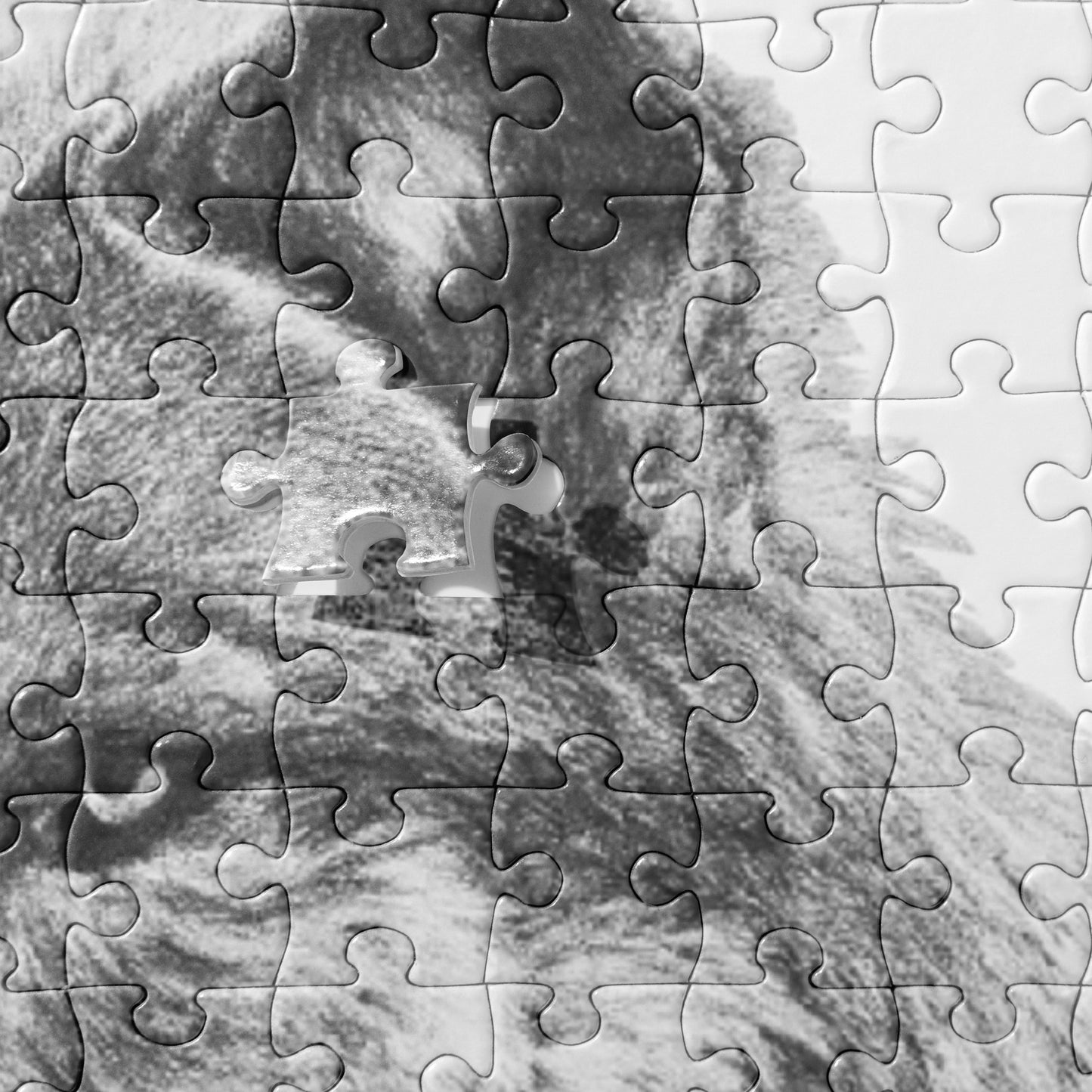 The "Wolf Jigsaw Puzzle" is from a drawing of mine created with a graphite pencil. It has been digitally optimized and transferred to a pressed paper chipboard which makes it suitable for framing.