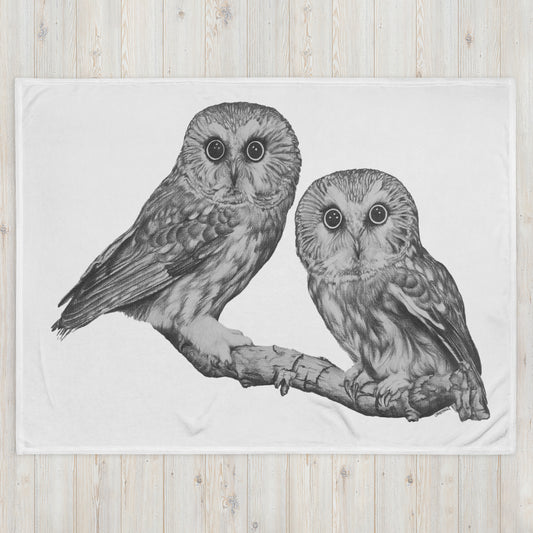 "Owl Throw Blanket(W)" is of two owls sitting on a branch with a "Who's That" look, drawn with a graphite pencil.
