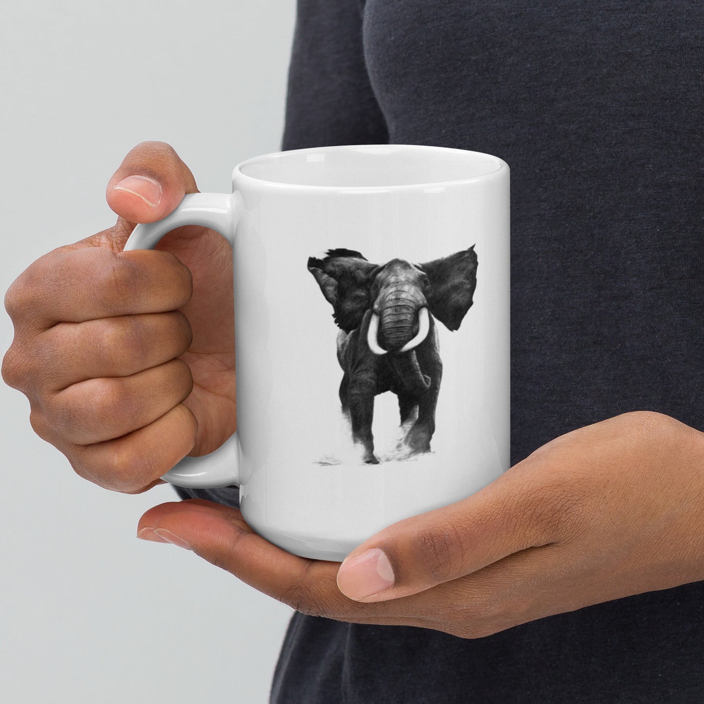 This "Elephant White Glossy Mug" is from a drawing of mine created with a graphite pencil. It has been digitally optimized and transferred to a 15oz white glossy mug.