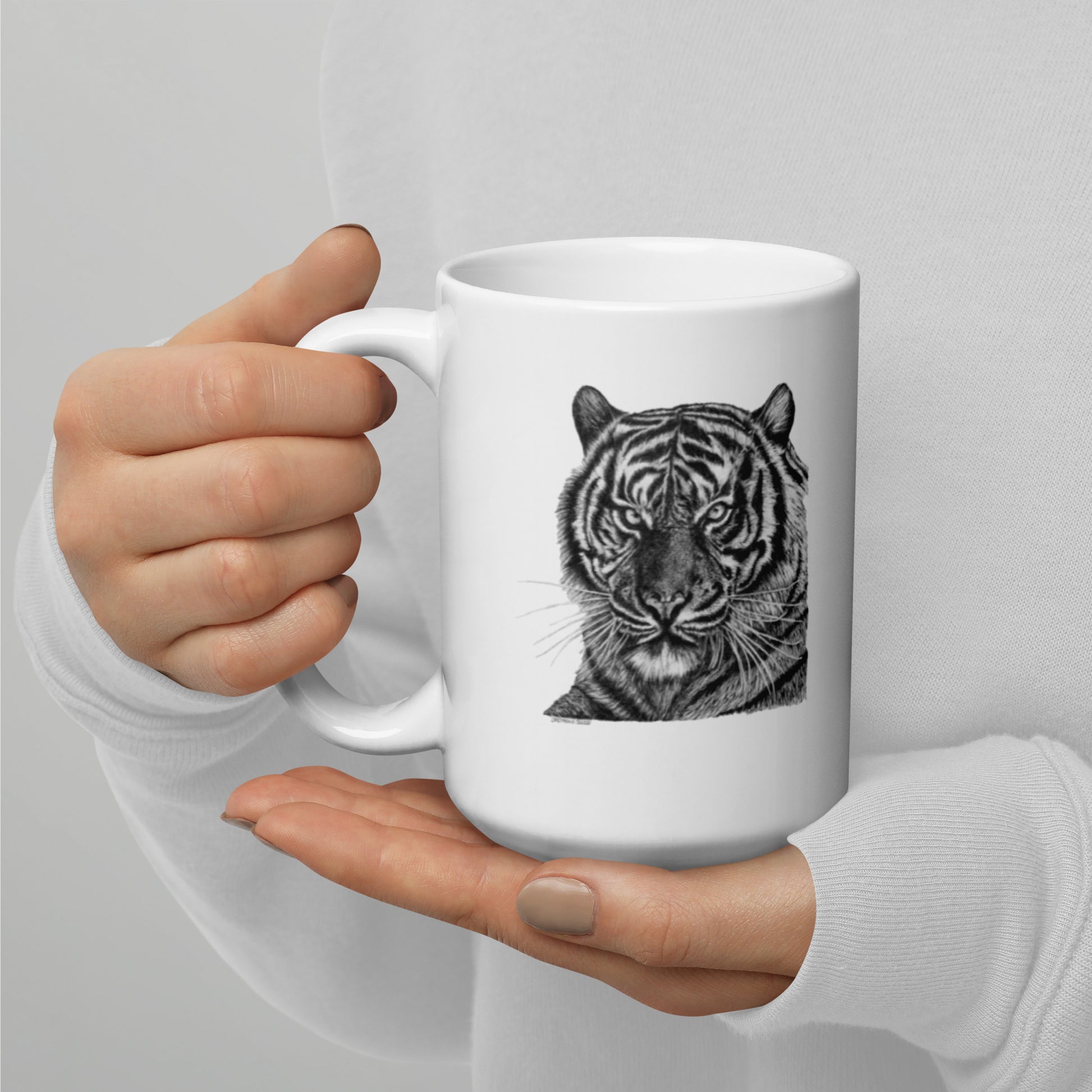 This "Tiger White Glossy Mug" is from a drawing of mine created with a graphite pencil. It has been digitally optimized and transferred to a 15oz white glossy mug.
