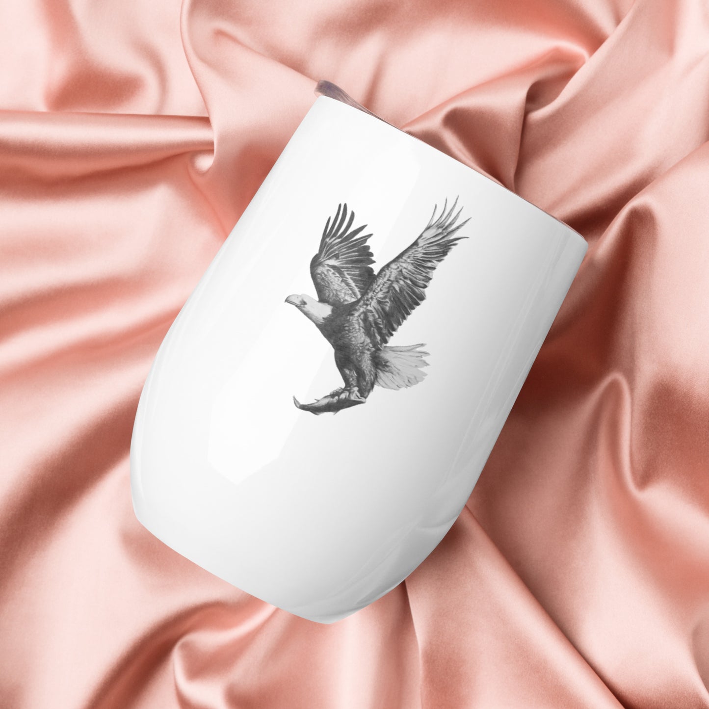 This "Eagle Wine Tumbler(W)" is from a drawing of mine created with a graphite pencil. It has been digitally optimized and transferred to a 12oz wine tumbler.