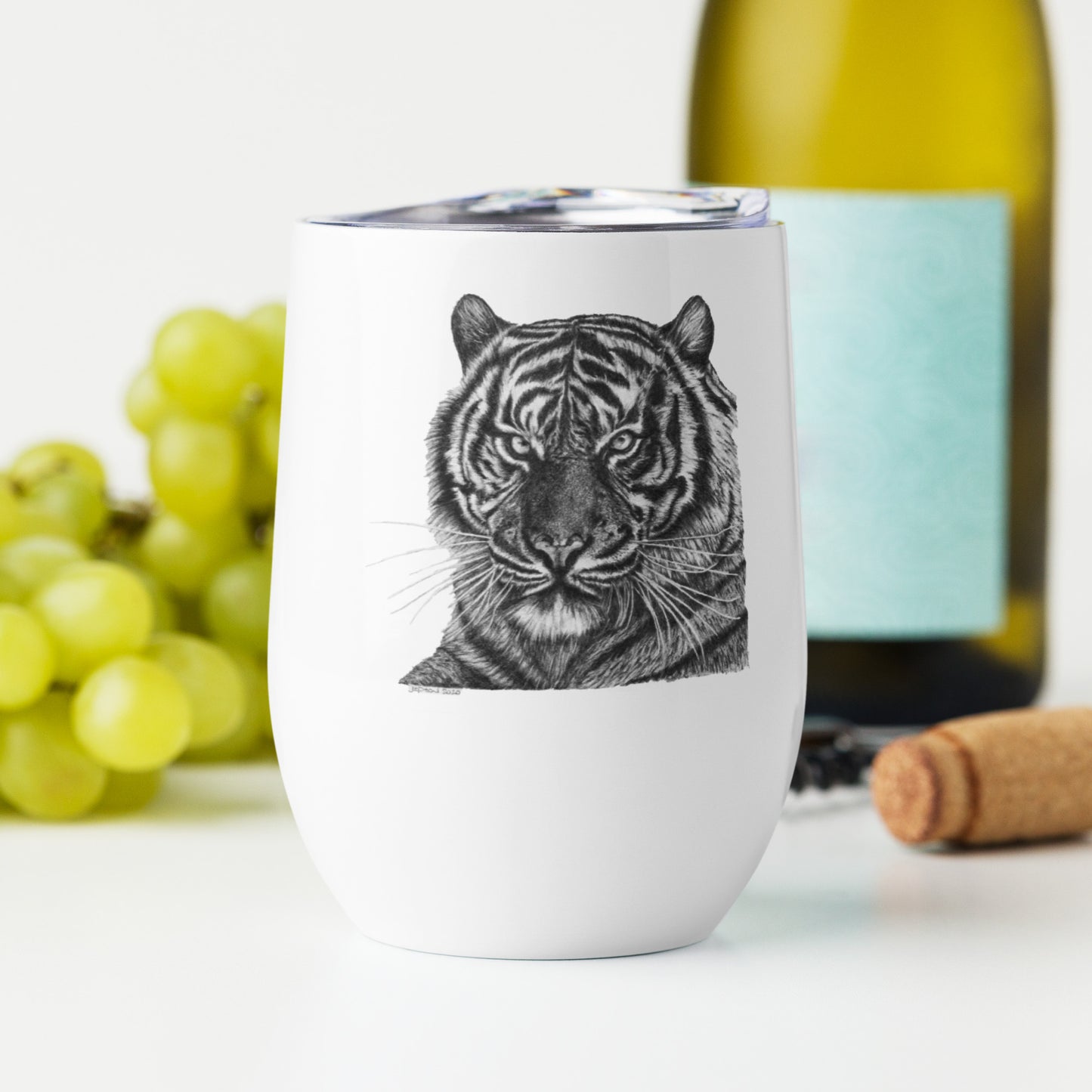 This "Tiger Wine Tumbler (W)" is from a drawing of mine created with a graphite pencil. It has been digitally optimized and transferred to a 12oz White Wine Tumbler.